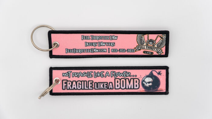 FTL Keychain - Pink - Wings - "NOT FRAGILE LIKE A FLOWER... FRAGILE LIKE A BOMB"